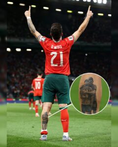 Rúben Neves pointing to the sky and showing off his Diogo Jota tattoo after scoring his first-career goal for Portuga